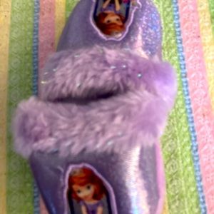 Child’s purple light up slipper